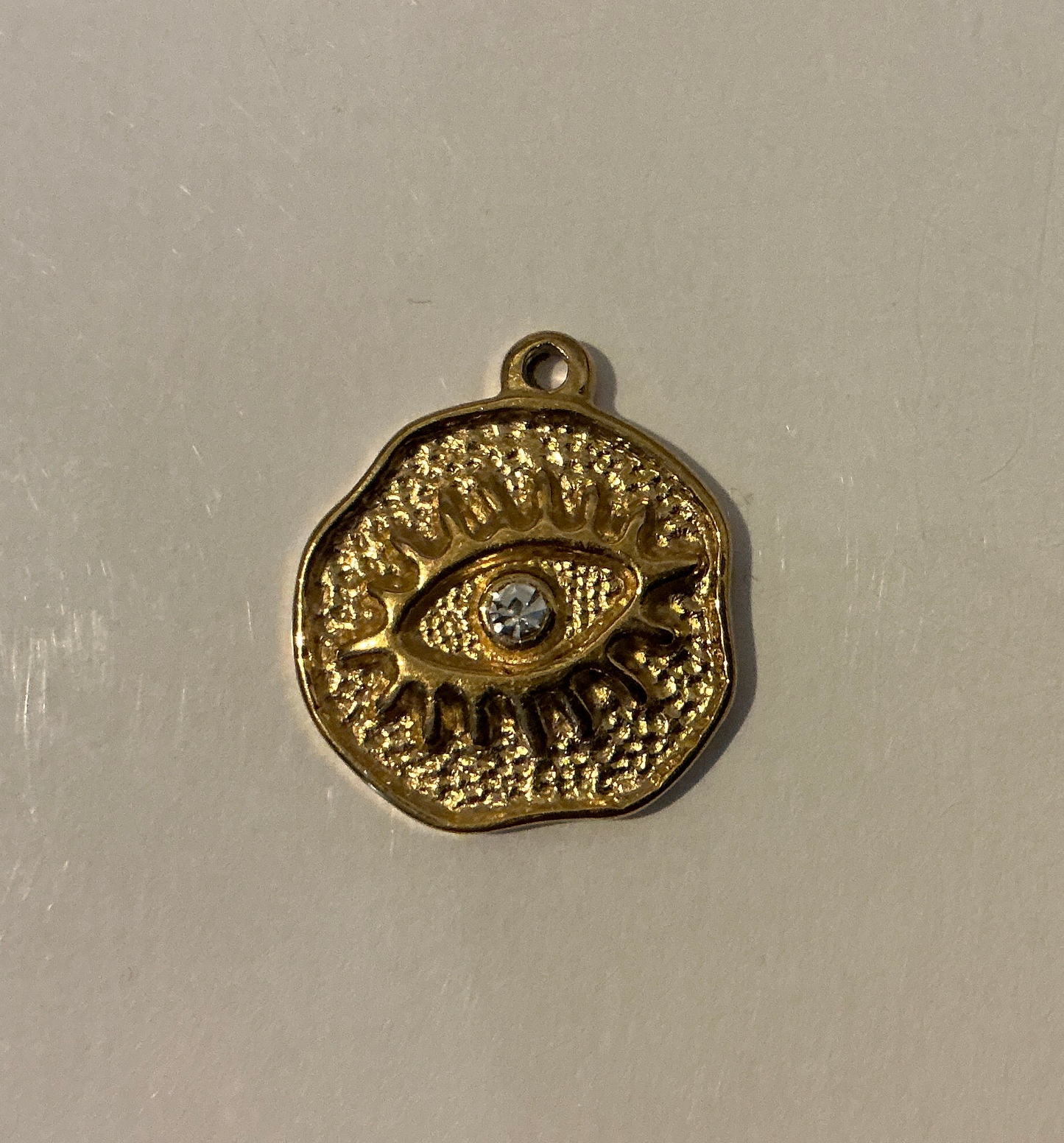 Breloque œil brillant